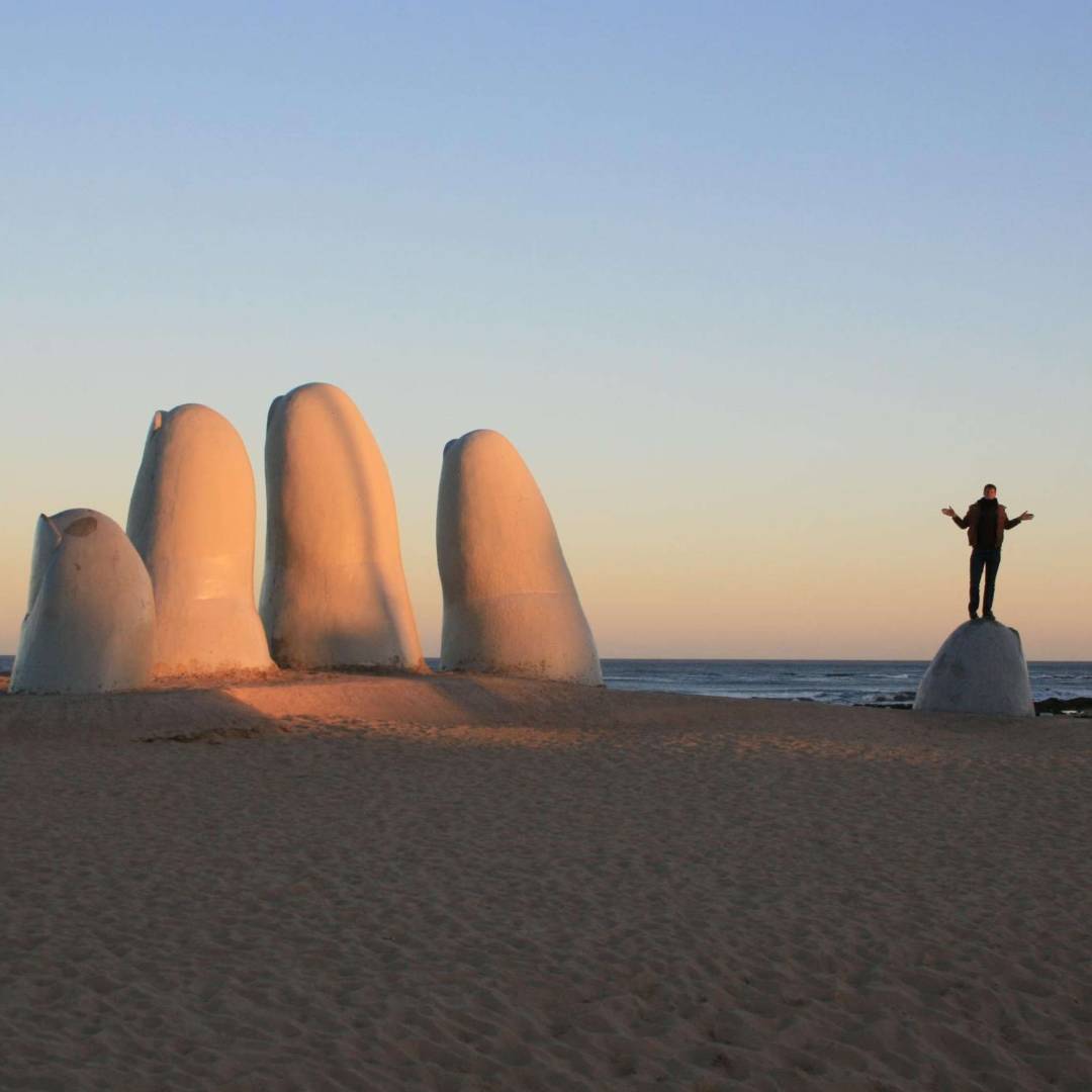 Custom-Travel-Planner-Network-10-Uruguay-Big-Hand-on-Beach