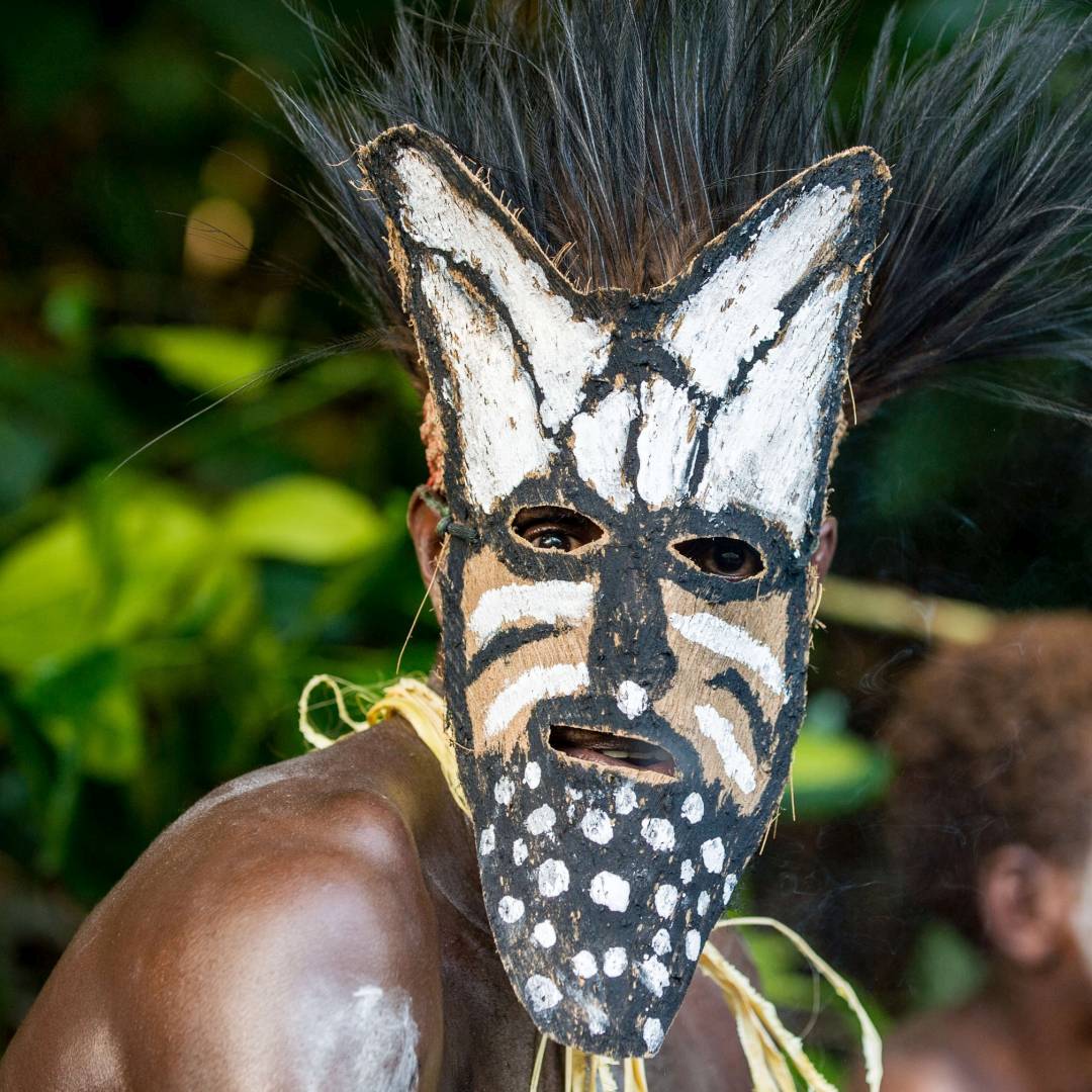 Custom-Travel-Planner-Network-2-Papua-Mask-Ceremony