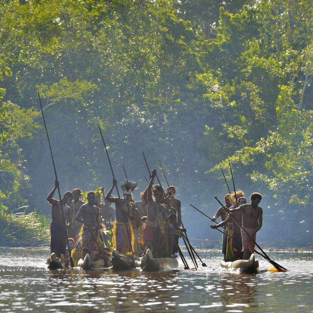 Custom-Travel-Planner-Network-5-Papua-Canoe-War-Asmat