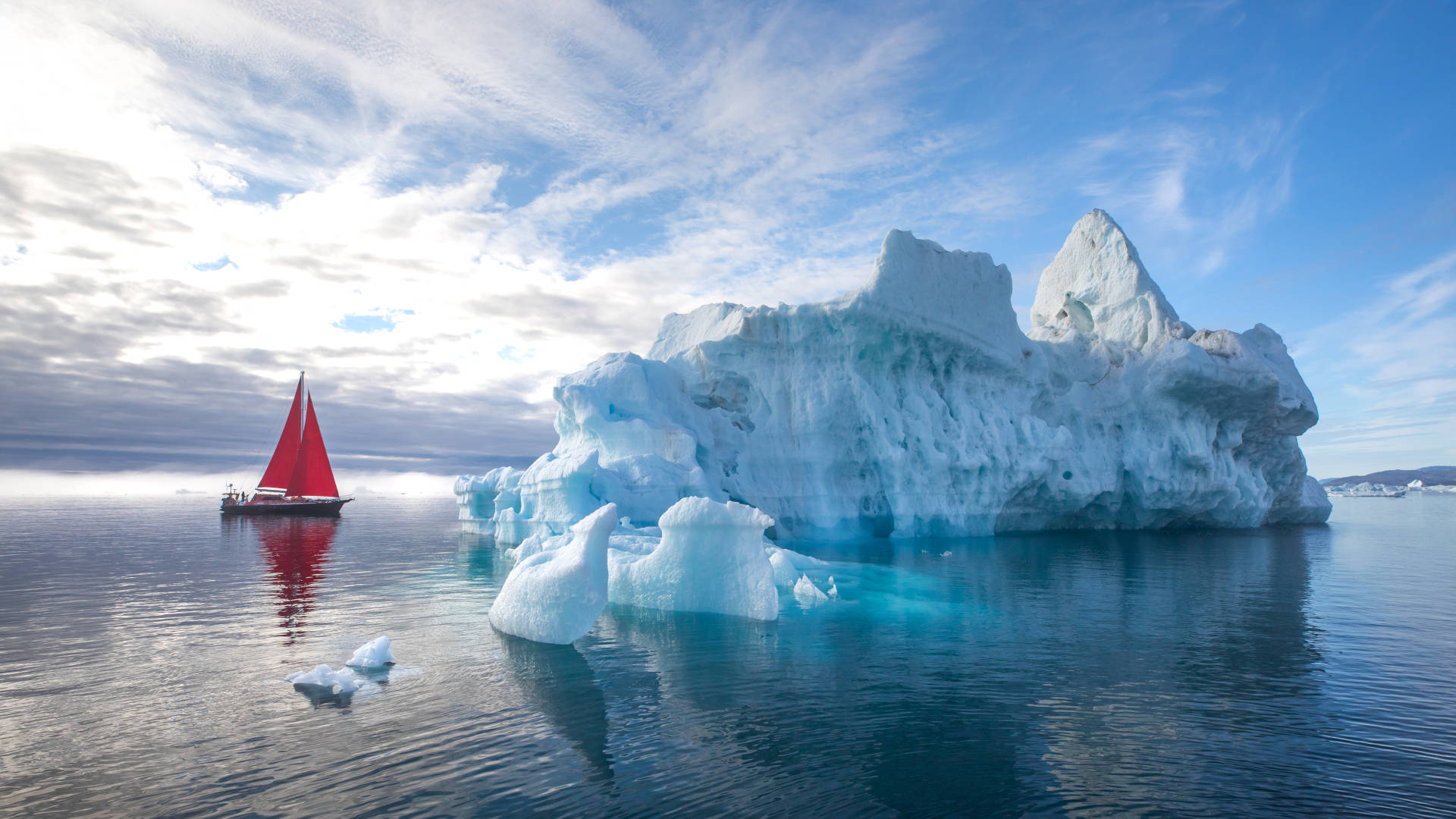 Custom Travel Planner Network-Greenland-Red Sailboat among Glaciers
